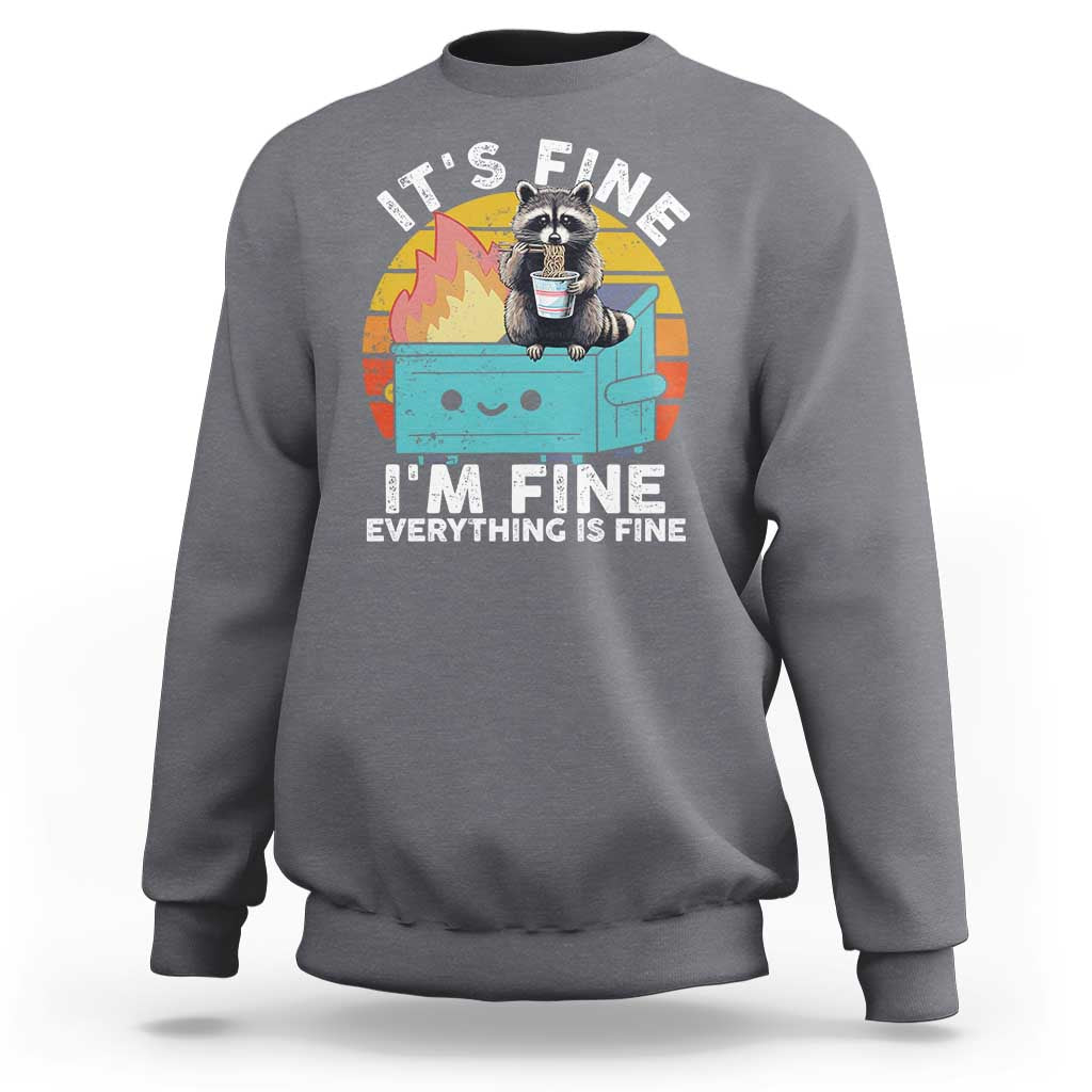 Charcoal gray raccoon graphic sweatshirt with “I’M FINE” meme text on front