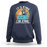 Navy raccoon graphic sweatshirt with “I’M FINE” meme text on front