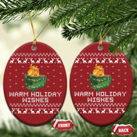 Red oval Christmas ornaments, front and back, with dumpster fire graphic and warm holiday wishes
