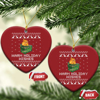 Red heart-shaped Christmas ornaments, front and back, with dumpster fire graphic and warm holiday wishes