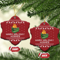 Red snowflake-shaped Christmas ornaments, front and back, with dumpster fire graphic and warm holiday wishes