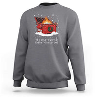 Charcoal gray crewneck sweatshirt with festive graphic of burning dumpster and “IT’S FINE, I’M FINE” text