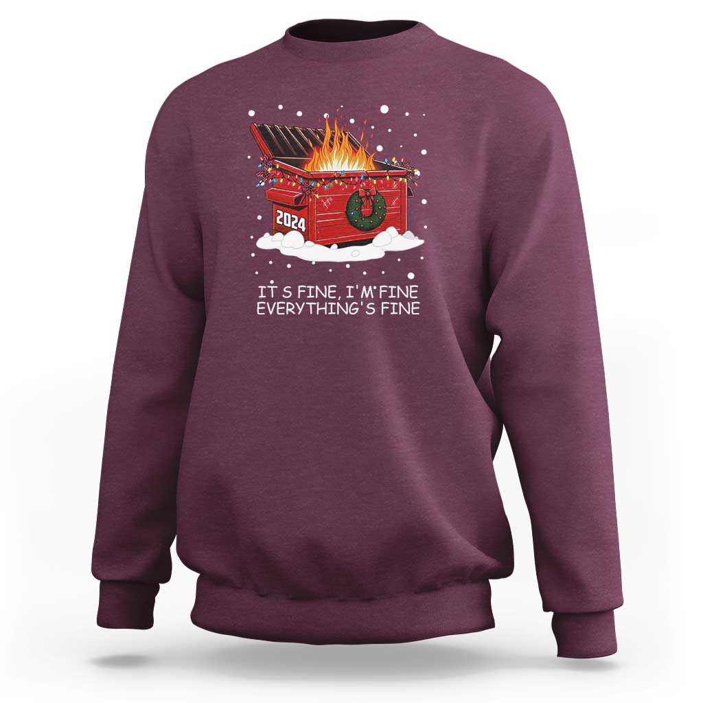 Maroon crewneck sweatshirt with festive graphic of burning dumpster and “IT’S FINE, I’M FINE” text