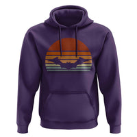 Purple pullover hoodie with bat graphic on chest and front kangaroo pocket.