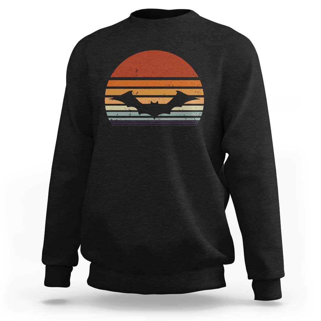 Black Halloween bat sweatshirt with retro sunset bat graphic, crew neck long sleeves.