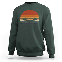 Dark forest green Halloween bat sweatshirt with retro sunset bat graphic, crew neck long sleeves.