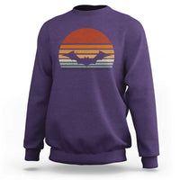 Purple Halloween bat sweatshirt with vintage sunset bat graphic, crew neck long sleeves.