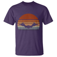 Purple T-shirt with vintage orange bat graphic and striped sunset design