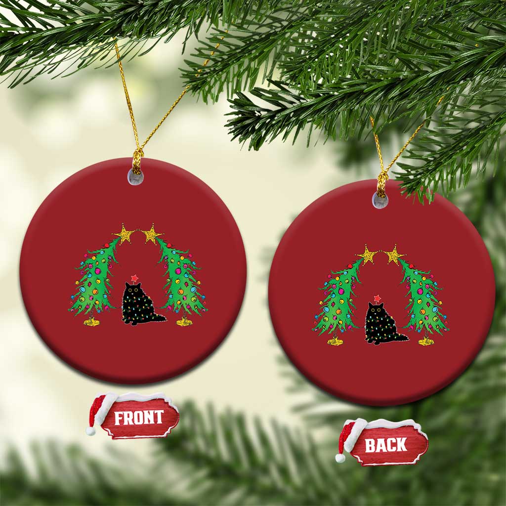 Set of two red round cat Christmas ornaments with black cat under wreath-like trees