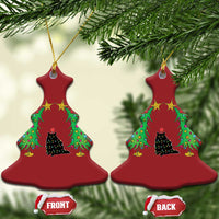 Set of two red Christmas tree-shaped cat ornaments with black cat under colorful wreath