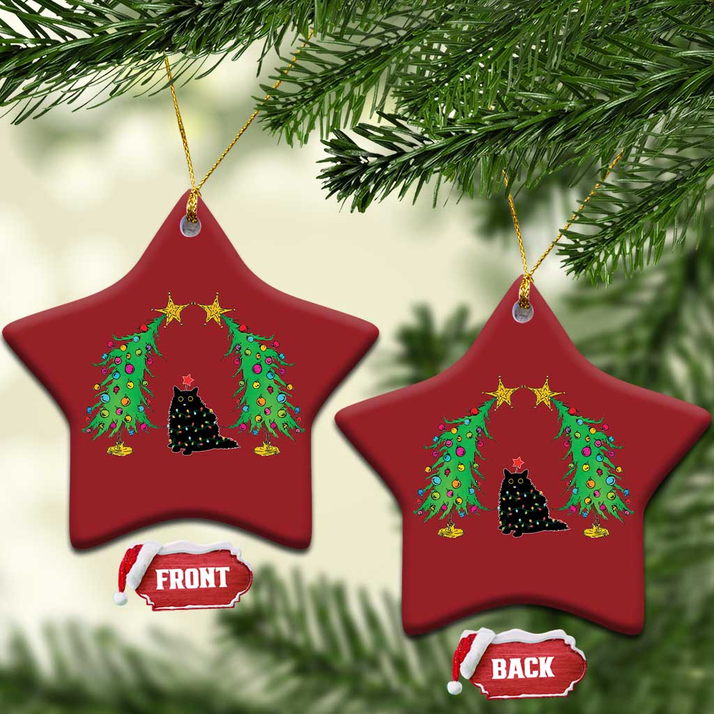 Set of two red star-shaped cat Christmas ornaments with black cat under colorful wreath