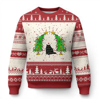Red and cream cat Christmas sweater with green tinsel wreath graphic and fair isle trim