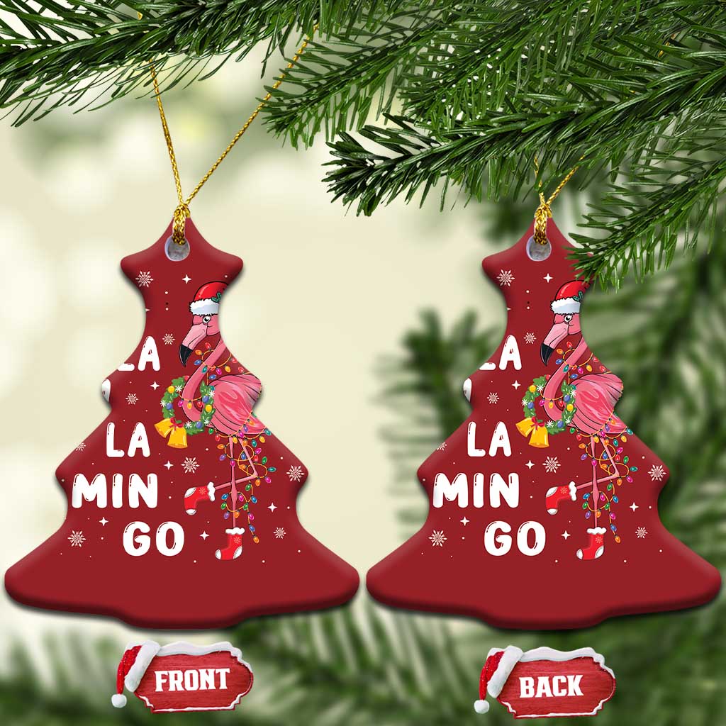 Two red Christmas tree-shaped flamingo ornaments with gold hooks and “FA LA MIN GO” text.
