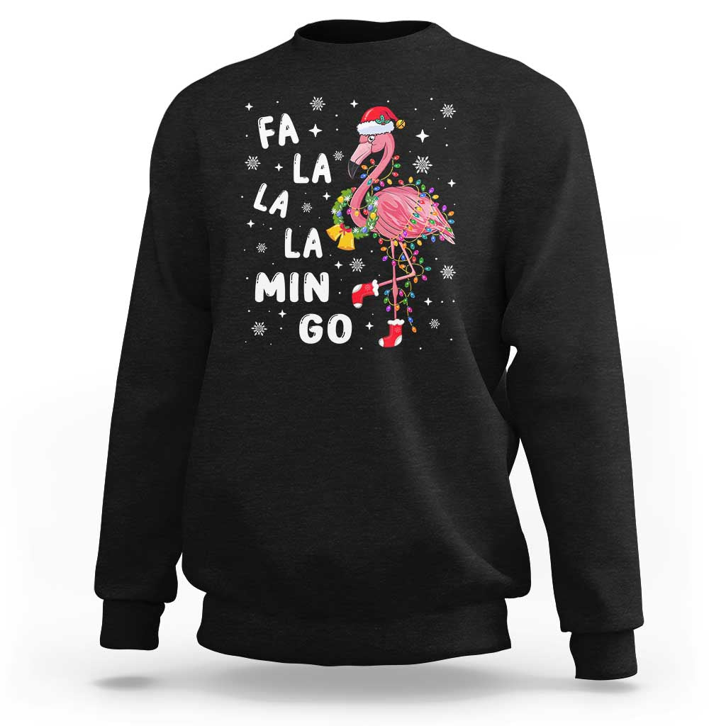 Black sweatshirt with flamingo holiday graphic and 'FA LA LA MIN GO' text