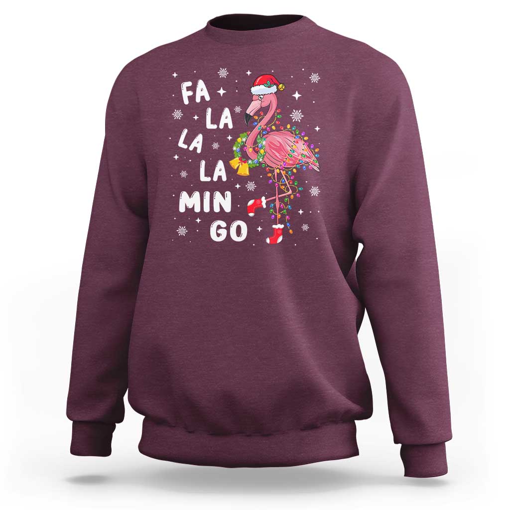 Maroon sweatshirt with flamingo holiday graphic and 'FA LA LA MIN GO' text