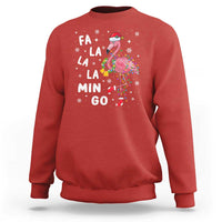 Red sweatshirt with flamingo holiday graphic and 'FA LA LA MIN GO' text