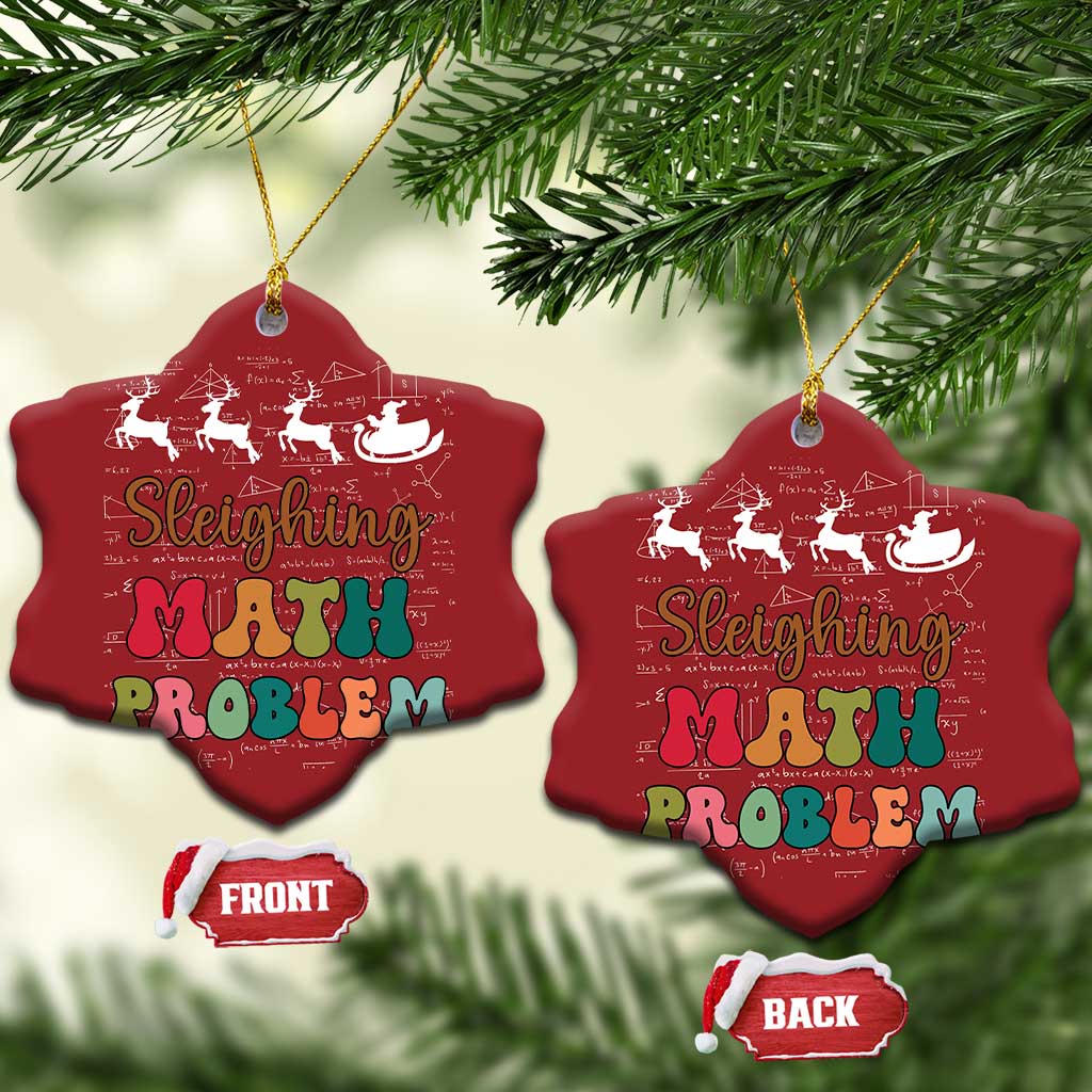 Two red shield-shaped math ornaments with 'Sleighing Math Problem' and front/back tags