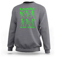 Charcoal gray sweatshirt with green Radiology skeleton graphic and 'You pose—We expose'.