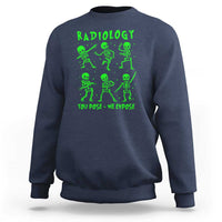 Navy sweatshirt with green Radiology skeleton graphic and 'You pose—We expose'.