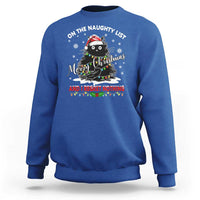 Royal blue crewneck sweatshirt with cat Christmas graphic and 'naughty list' slogan
