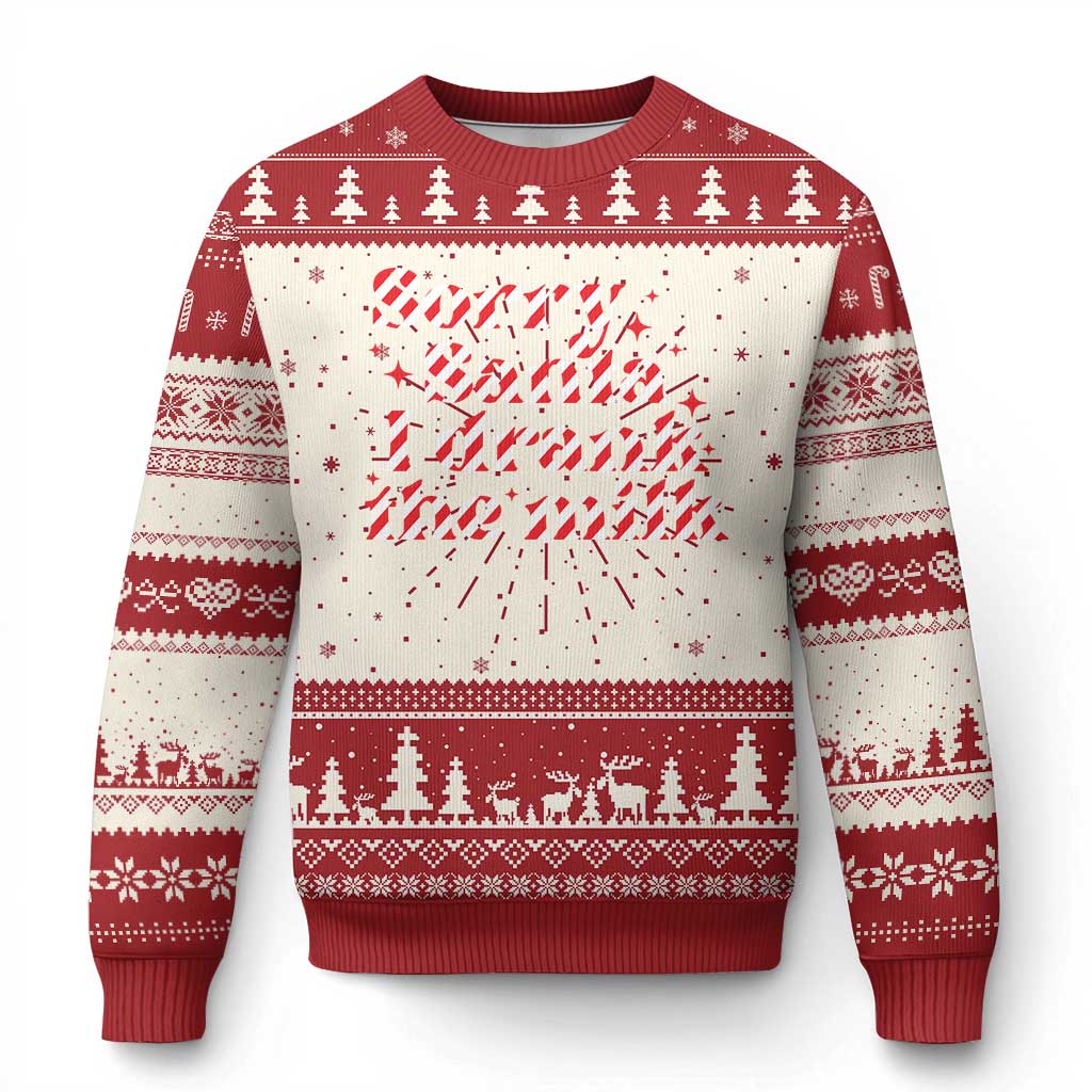 Baby ugly Christmas sweater with red and white fair isle pattern and bold graphic center
