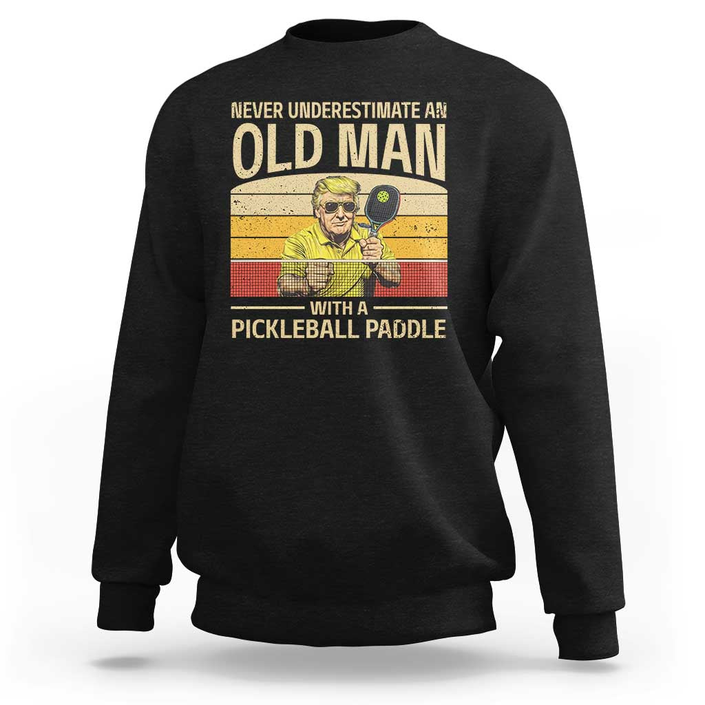 Pickleball sweatshirt, black crewneck with front pickleball graphic print