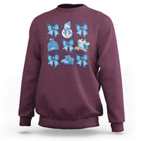 Maroon Christmas sweatshirt with blue bow snowman and gift graphic, crew neck