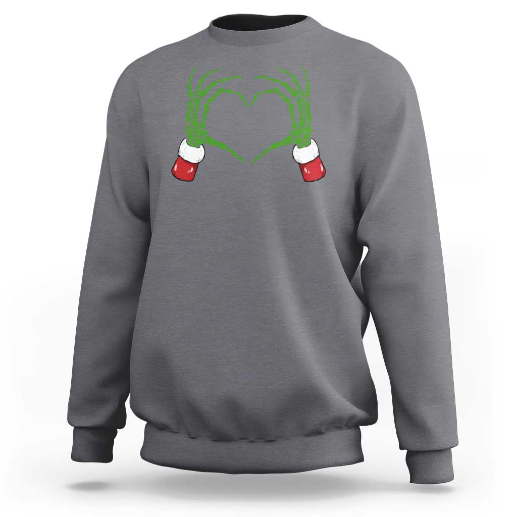 Charcoal gray sweatshirt with green skeleton-heart hands graphic on chest