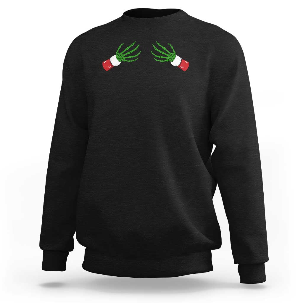 Women's Christmas sweatshirt in black, graphic green skeleton hands on front