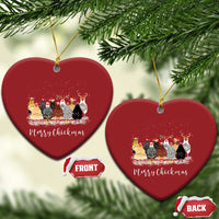 Pair of red heart ornaments with Merry Chickmas chicken illustration