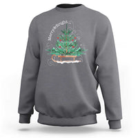 Charcoal gray Christmas sleigh sweatshirt with colorful tree graphic on the front.