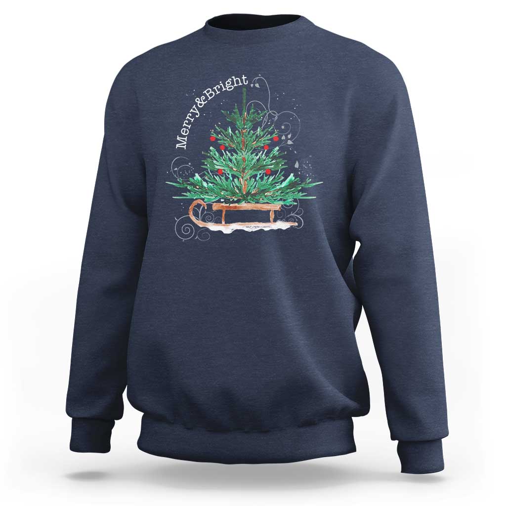 Navy Christmas sleigh sweatshirt with colorful tree graphic on the front.