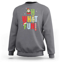 Charcoal gray crewneck Christmas sweatshirt with Santa, “What Fun” text, and tree graphic