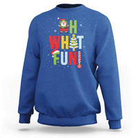 Royal blue crewneck Christmas sweatshirt with Santa, “What Fun” text, and tree graphic