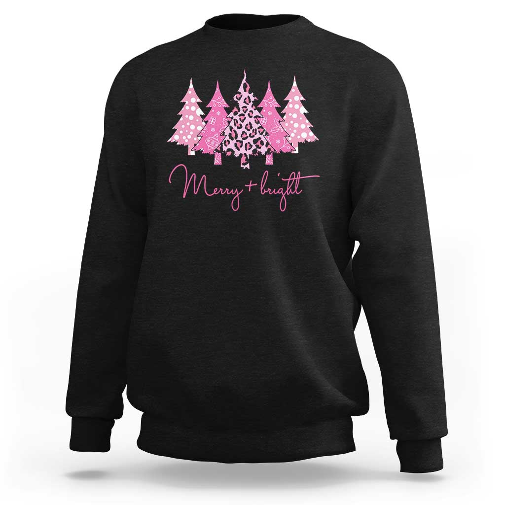Black crewneck sweatshirt with pink leopard tree graphic and “Merry flit” text