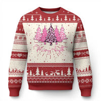 Red crewneck sweater with pink leopard-print tree graphic and festive fair isle borders