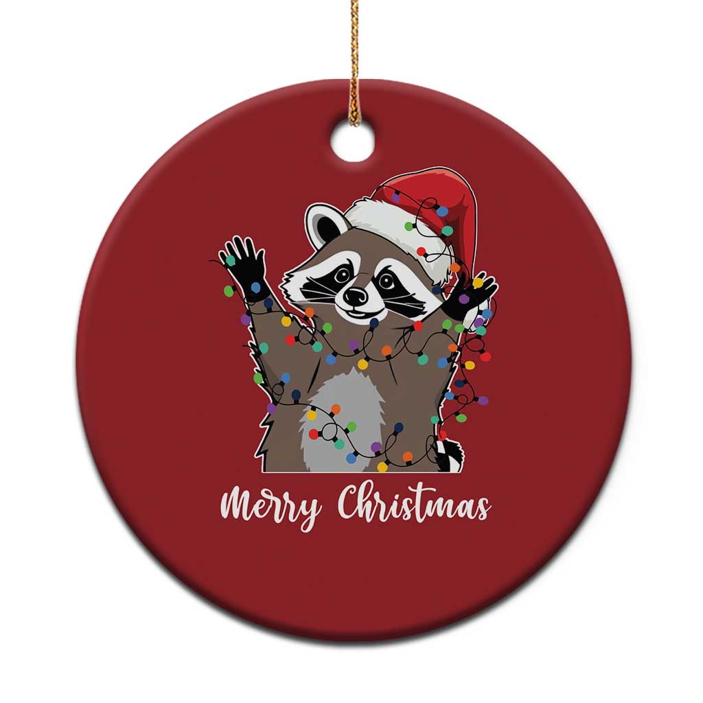 Red round raccoon Christmas ornament with Santa hat and 'Merry Christmas' text