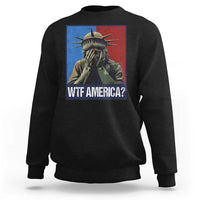 Black sweatshirt with Statue of Liberty graphic and “WTF AMERICA?” text on chest