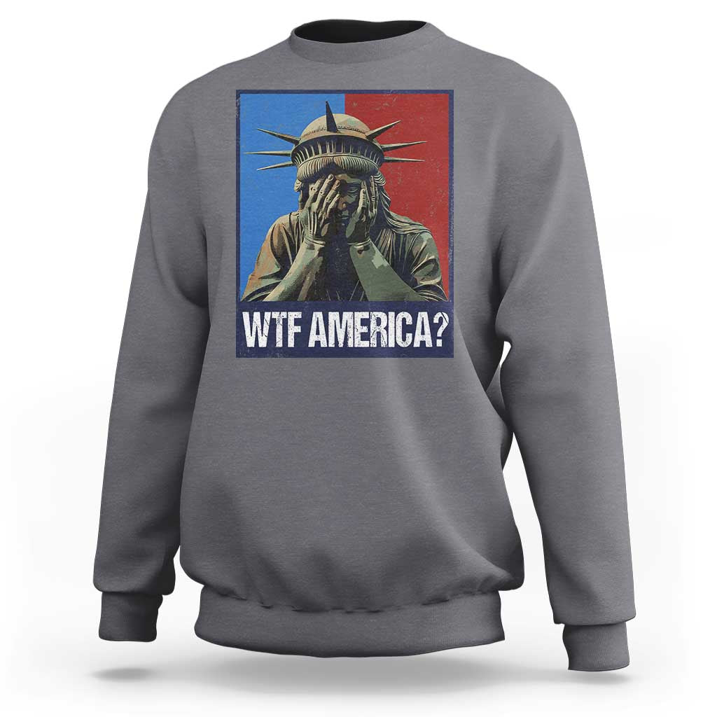 Charcoal gray sweatshirt with Statue of Liberty graphic and “WTF AMERICA?” text on chest