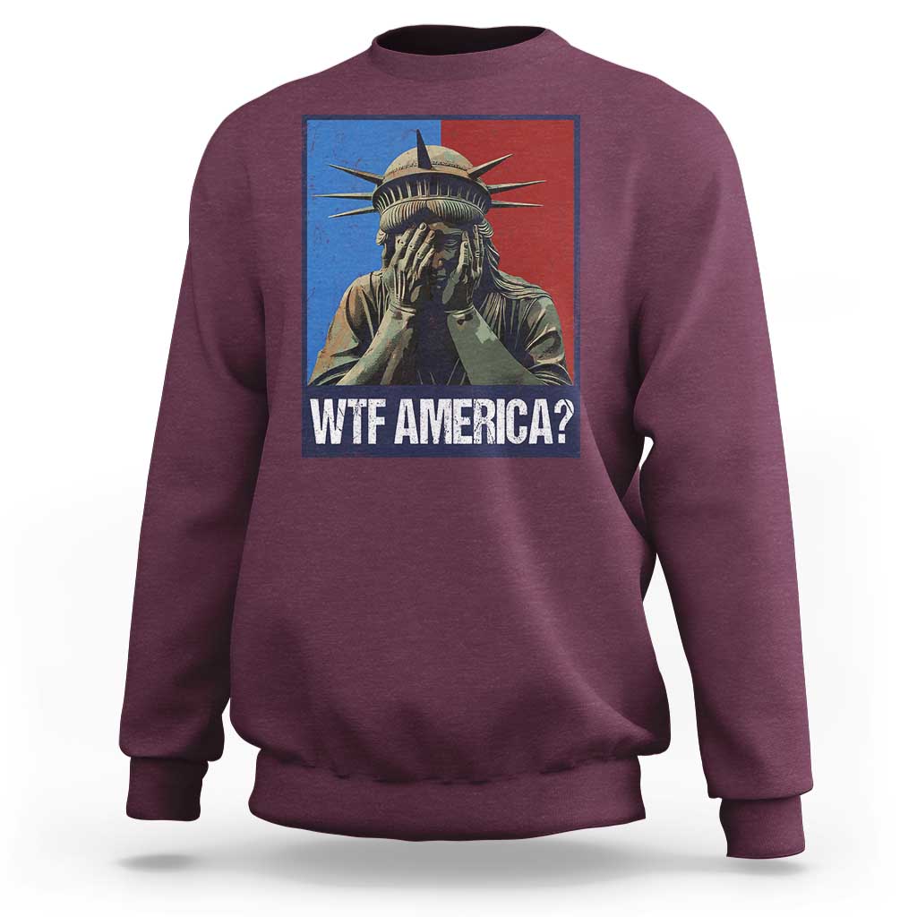 Maroon sweatshirt with Statue of Liberty graphic and “WTF AMERICA?” text on chest