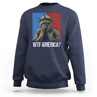 Navy sweatshirt with Statue of Liberty graphic and “WTF AMERICA?” text on chest