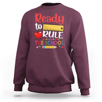 Maroon crewneck sweatshirt with colorful ruler "Ready to Rule" front graphic