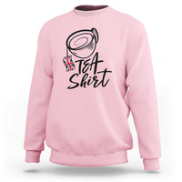 Light pink crewneck sweatshirt with "Tea Shirt" graphic and UK flag