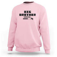 Light pink crewneck sweatshirt with Big Brother gaming logo graphic on front.