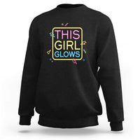 Black sweatshirt with neon multicolor “This Girl Glows” front graphic and ribbed cuffs