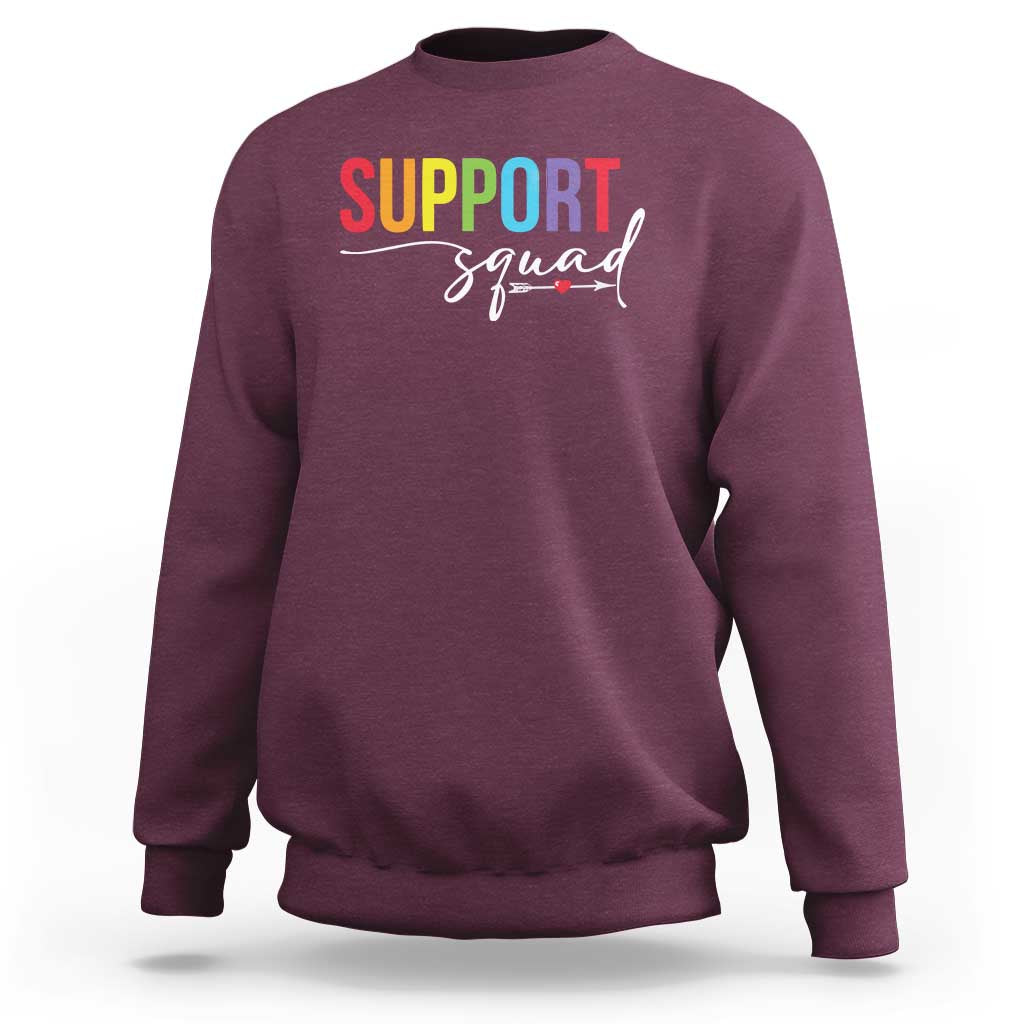 Maroon crewneck sweatshirt with “Support” and “Squad” graphic on the chest