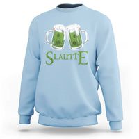 Light blue sweatshirt with “Slainte” text and two illustrated beer mugs graphic
