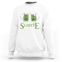 White sweatshirt with “Slainte” text and two illustrated beer mugs graphic