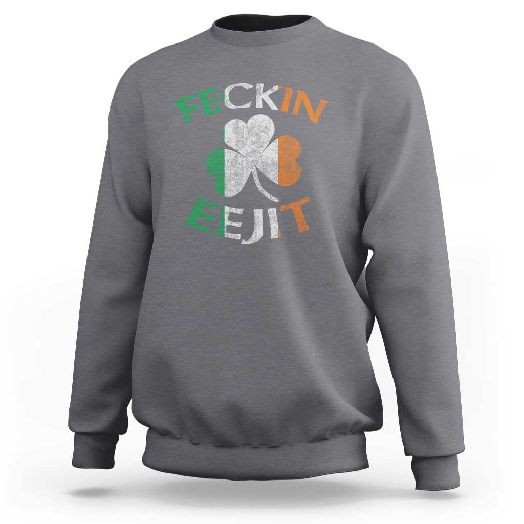 Charcoal gray sweatshirt with shamrock graphic and slogan text on the back