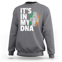 Charcoal gray crewneck sweatshirt with “It’s in my DNA” Irish graphic on the back